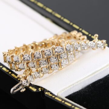 Złota bransoletka z diamentami 0.25ct tenisówka 17,8cm 9K