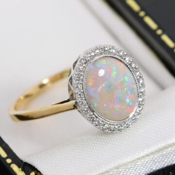 Złoty pierścionek z pięknym opalem i diamentami 0.26ct 18K