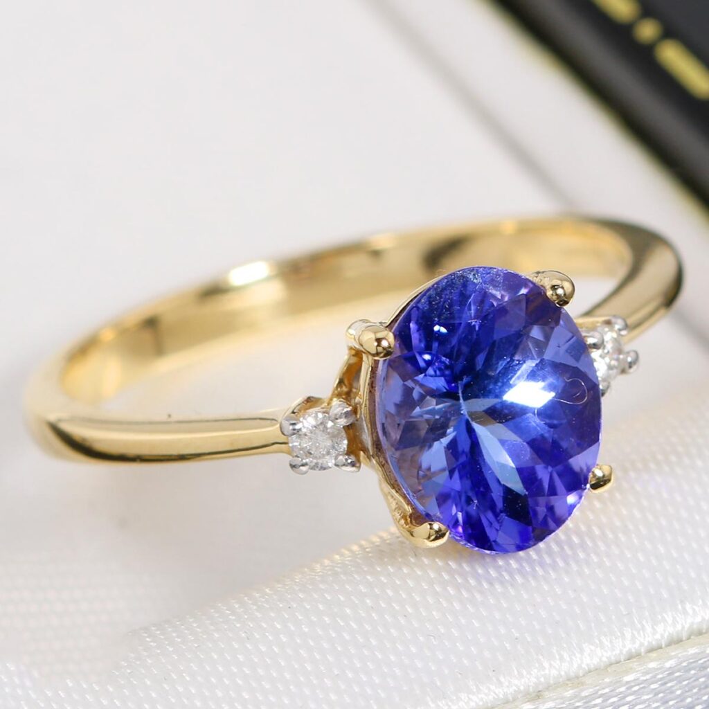 Złoty pierścionek z tanzanitem 2.45ct i diamentami 14K